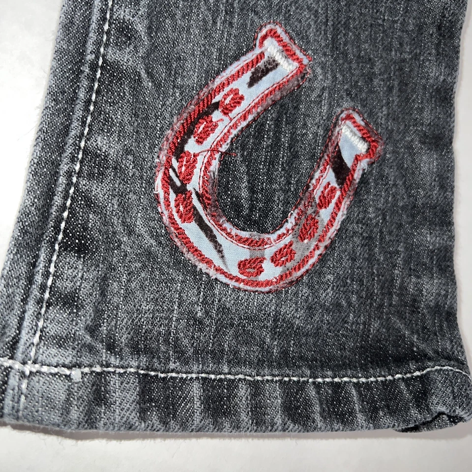 Pantalones de mezclilla vaqueros Wrangler 12 meses negros costuras plateadas herradura Foto 4 de 4