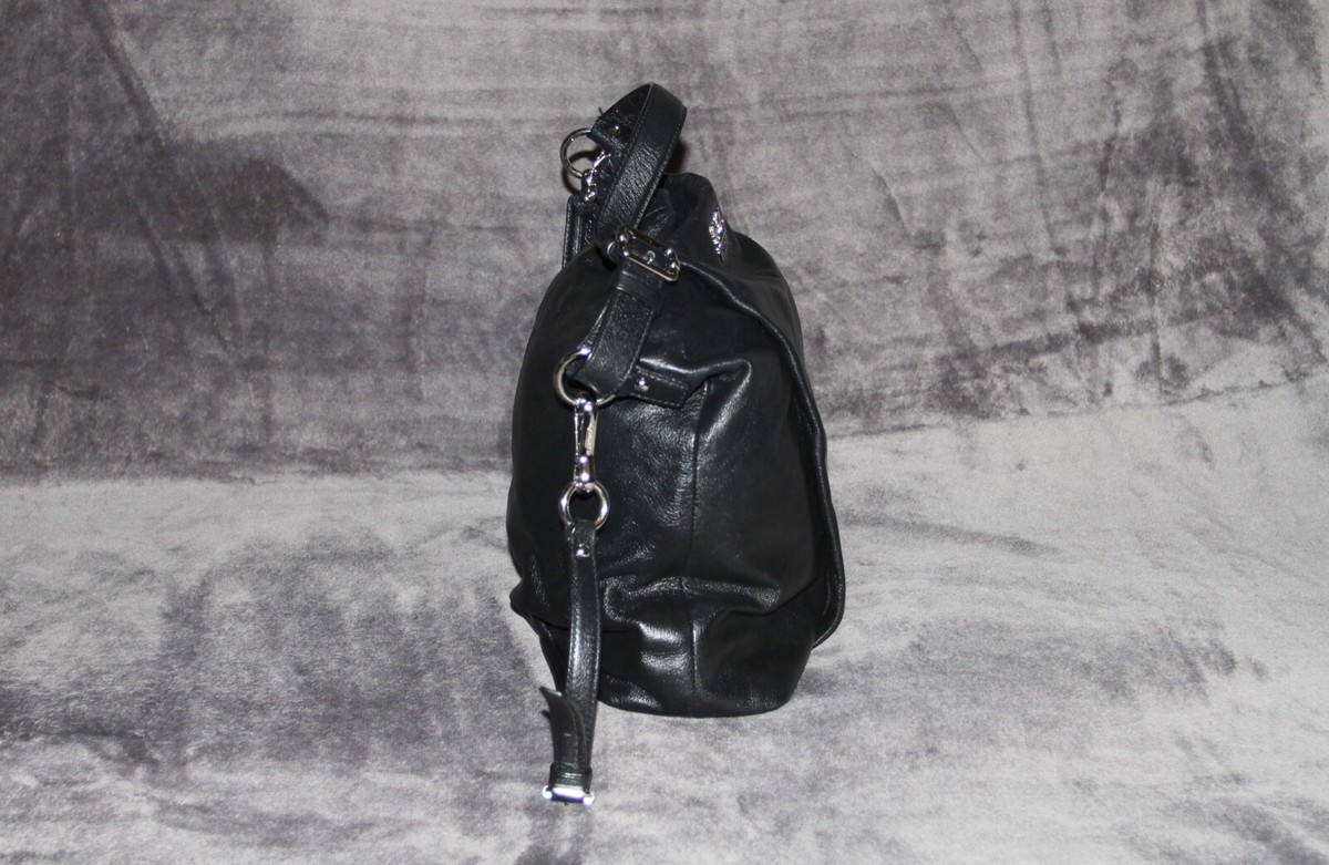 Coach black leather bag with shoulder strap outside side zipper