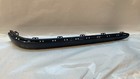 Rear bumper trim bar molding