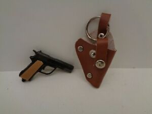 VINTAGE Spielzeug Revolver  Gewehr mit Tasche  Schlüsselanhänger  80er Jahre