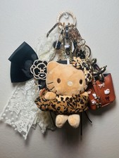 Hello Kitty Plush Accented With A CuteCharm  With A Mini Bag Charm Keychain Set