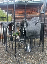 Stunning Black Ornately Tooled Spanish Saddle with Bridle and complete trappings