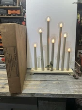 Noma wood base 7 light staggered candoliers