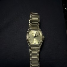 Futura Quartz Wristwatch Silver Tone Metal Band Silver Dial Tonneau