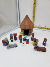 13 piece handcrafted  pottery village figurines w/ coconut hut