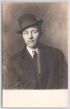 Postcard RPPC Dapper Gentleman with Tilted Hat Studio Portrait circa 1910