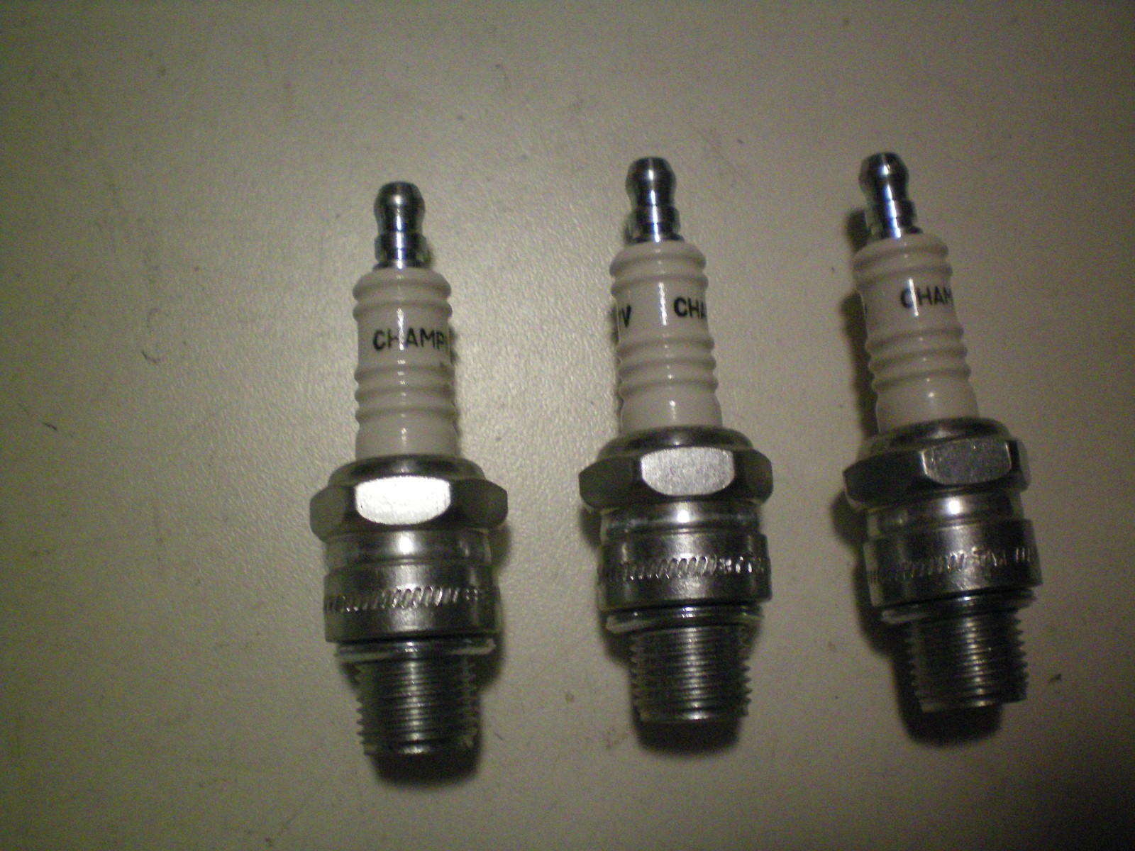 CHAMPION QUANTITY THREE  OF  #UL77V / #831-1  SPARK PLUGS , FREE SHIPPING