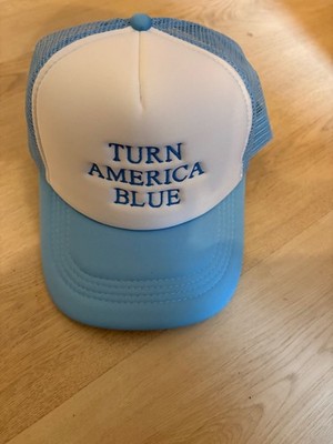 caps with ''Make America Blue'' caption embroidered on cap. Says'Make' not 'Turn'