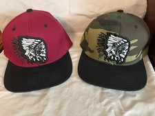 2 Skull Chief snapbacks 1 Camo and 1 red and black