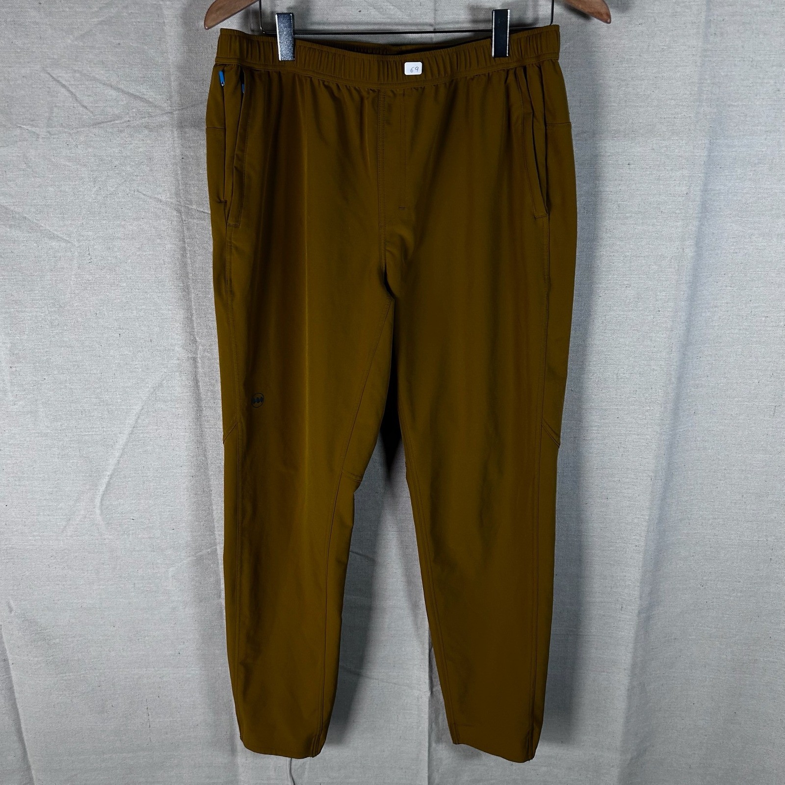 Janji Mens Transit Tech Running Pants Brown Ochre Size Medium Tapered Athletic