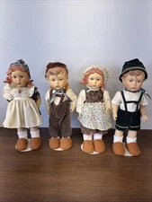 Vintage Set of 4 Brinn Co 10” Porcelain Dolls on Stand