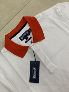white and red polo t shirt