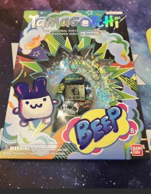 SDCC 2022 ORIGINAL TAMAGOTCHI IN HAND Gen 2 Mimitchi Bandai Comic