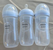 3 Phillips Avent Baby Bottles. 2 Have The Lid. Holds 11 Ounces. Fast Nipple Flow