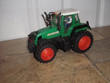 RARE Vintage 8 7/8" long Farm Tractor with a driver and pull back action