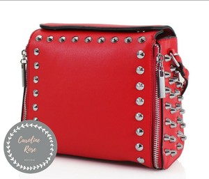 red studded purse