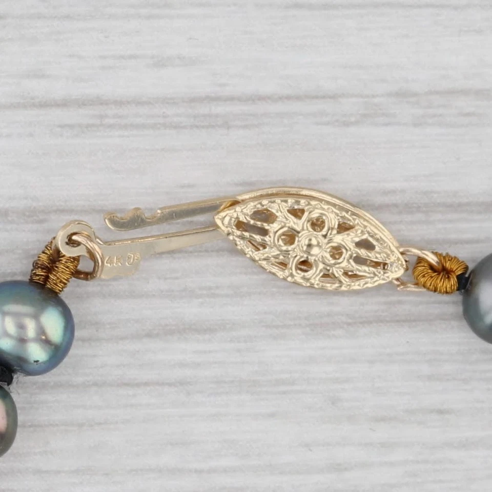 Brazalete de una sola hebra de perlas cultivadas negras de oro amarillo de 14 k 7,25" Foto 4 de 4