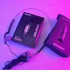 Walkman WM-2091 with case and headphones, looks great, powers on, belt Is fried.