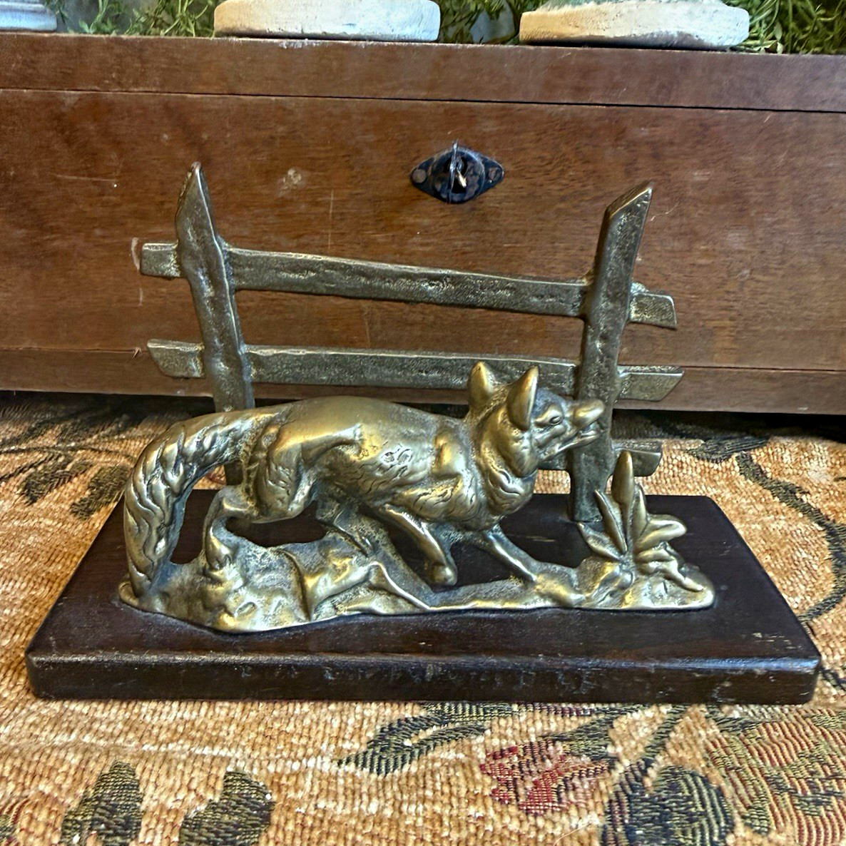 Brass letter holder cast with a fox and fence design.