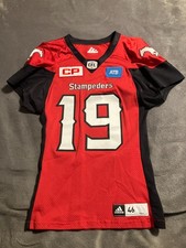 2016 BO LEVI MITCHEL QB CALGARY STAMPEDERS, CFL. AUTOGRAPHED RED GAME USED JERSY