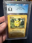 CGC 8.5 Pikachu Pokémon Jungle Unlimited 60/64 1999 Wizards of the Coast Card