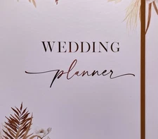 ZICOTO wedding planner and organizer. 11 3/4x10x1”. Hardcover-Spiral Binder.