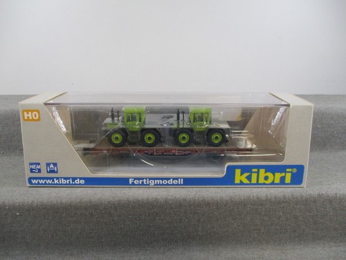 Kibri H0 26256 Güterwagen Niederbordwagen mit zwei MB Tracs in OVP | Zustand: Gebraucht