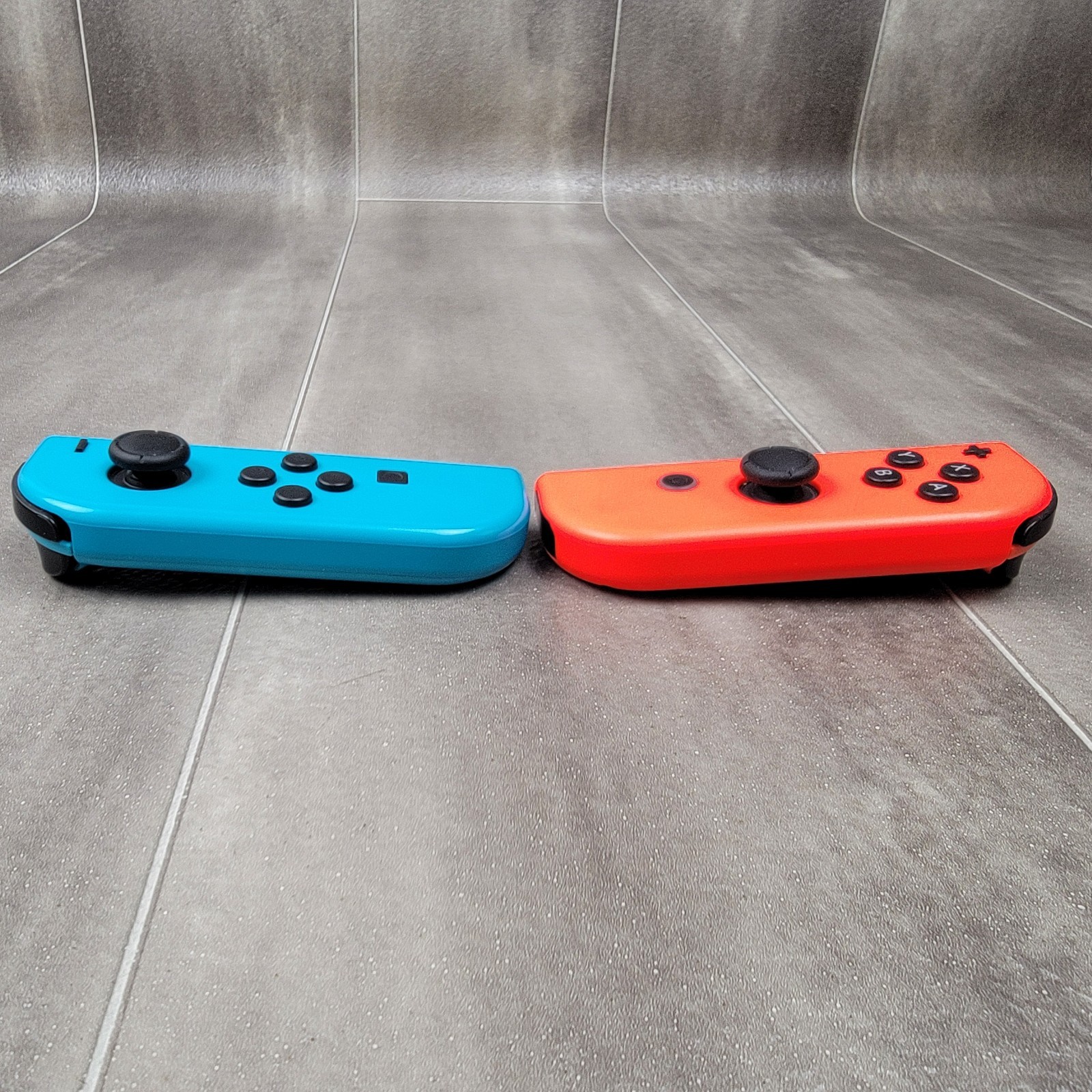 Nintendo Switch Joy-Con Coppia Controller HAC-015/HAC-016 Rosso Neon/Blu Neon foto 4
