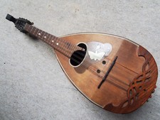 Very old mandolin w. inlayed butterfly