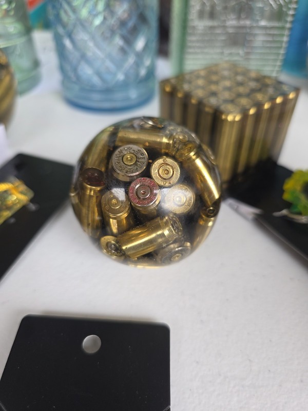 Clear Resin Paperweight with Embedded Brass Bullet Cartridge Casings, Gold