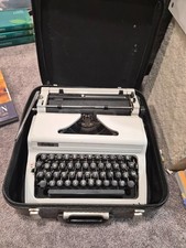 Typewriter - Erika 105, portable with carrying case, NEEDS REPAIR with ribbon thumbnail