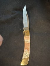 Buck 110 2006 Faux Mother of Pearl with Pink Backing. Beautiful Condition