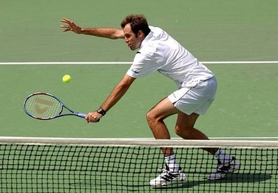 Greg Rusedski of Great Britain hits a backhand volley v Albert Cos- Old Photo