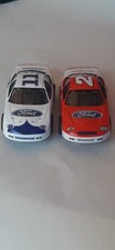2 Both New Out of Package Autoworld Super lll Ford Tarus Slot Car Stock Cars