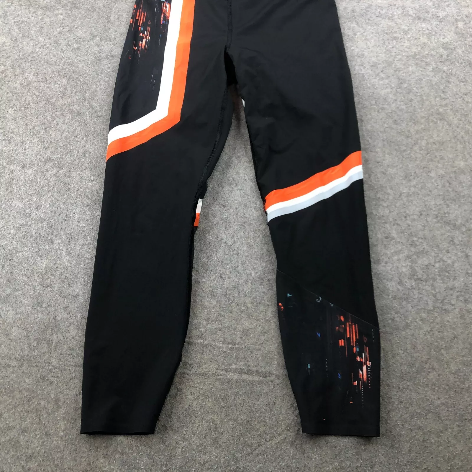 sweaty-betty compression zero gravity yoga orange leggings