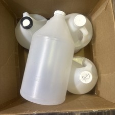 Preowned case of 4 1 Gallon Jugs With CAPS 128oz HDPE Plastic Bottles