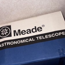 Meade Astronomical Telescope with Tripod and Eyepiece Accessories