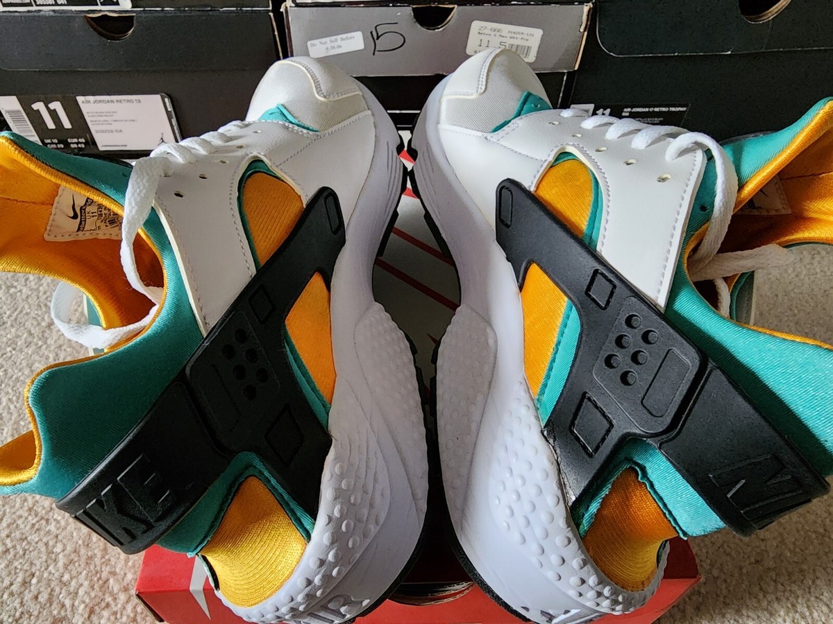 nike huarache turquoise gold