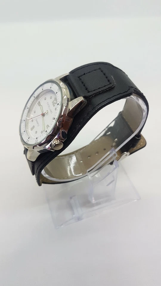 Reloj Excellanc Sports Simple Blanco y Plateado colocado en correa de puño grande negra Foto 4 de 4