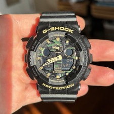 Casio G-SHOCK GA-100C Men's Camouflage Analog Digital Shock-Resistant Watch