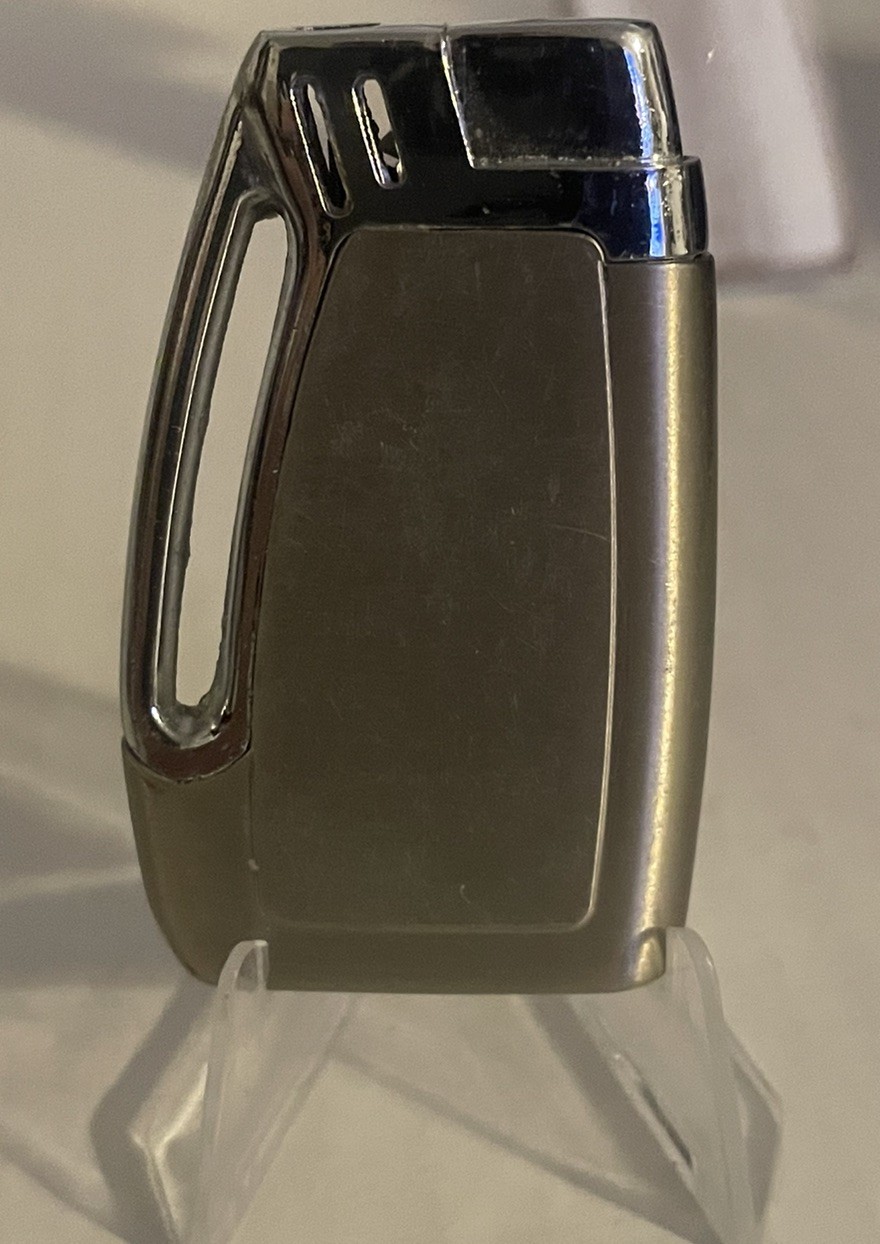 Unique Unbranded Butane Lighter-Sparks but is out of Butane