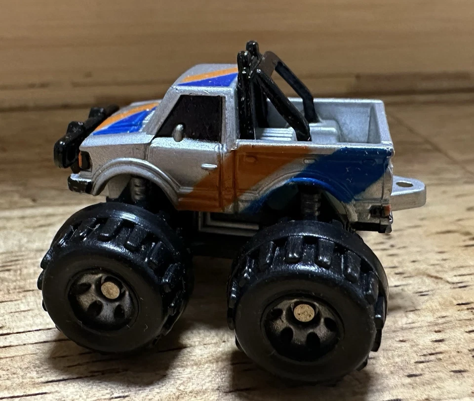 Vintage Micro Machines Datsun Pickup 4x4 Monster Truck 1.25" Scale Model Silver - Image 2 of 4