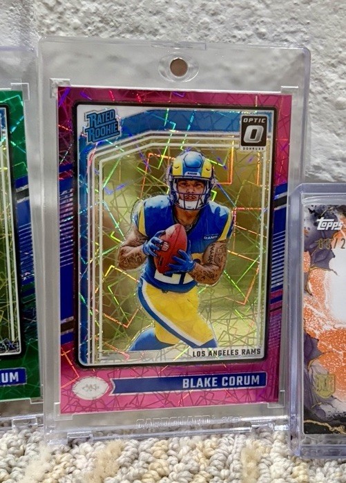 Blake Corum 2024 Panini Donruss Optic Rated Rookie Pink Velocity Prizm /80 #208