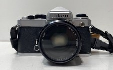 Vintage Nikon FE 35mm SLR Film Camera  2 Lens Lot 50mm  75-150mm Tested