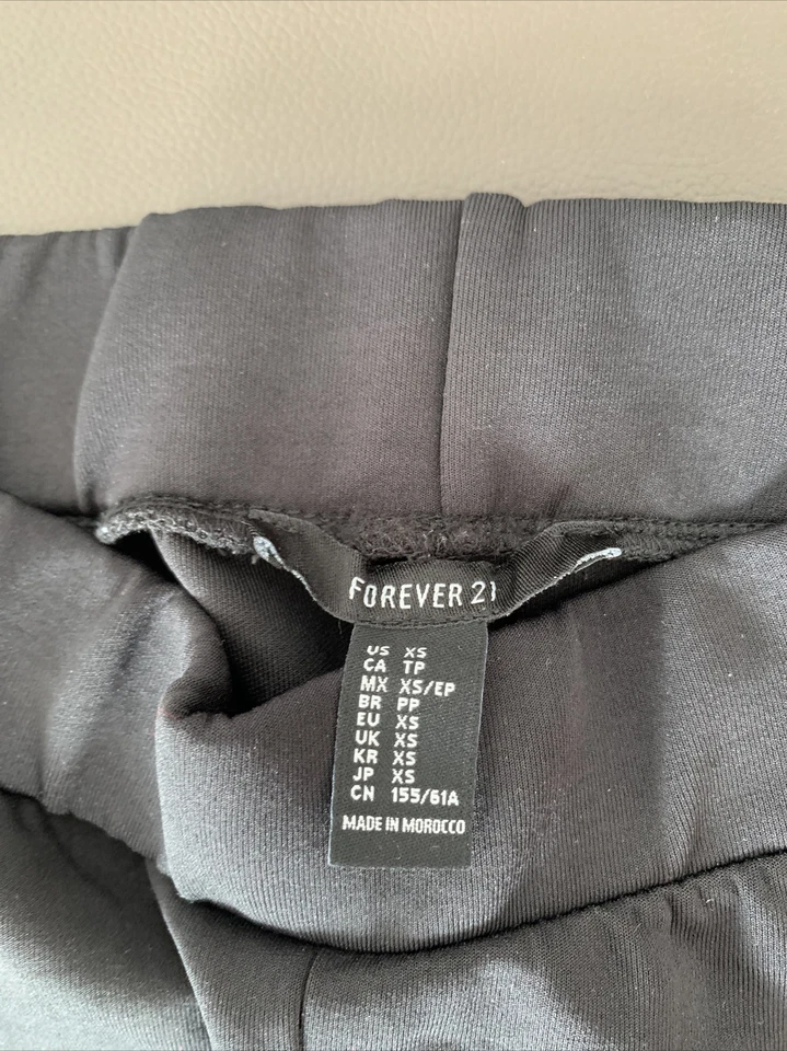 Forever 21 Black Leggings Gold Zippered Side Faux Pockets Size XS - Image 4 of 4