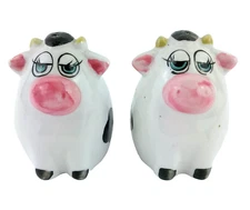 Cows Salt n Pepper Shakers Set Black & White Bulbous Round Bodies Blue Eyes 