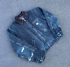 J001 BLK Faded and distressed black Carhartt Detroit Jacket made in USA