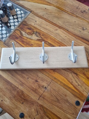 Handmade 200 year old oak board with its own history.  Hanger with three Hooks  