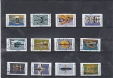 FRANCE 2020 ANIMAUX DU MONDE REFLETS  SERIE COMPLETE DE 12 TIMBRES OBLITERES