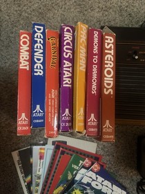 Atari 2600 Console Bundle Joysticks Paddles 7 Games Manuals and More